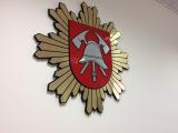 Priešgaisrinės apsaugos ir gelbėjimo departamento ženklas salėje